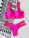 Women's rose red bikini with contrast push-up pads and underwire support on a mannequin.