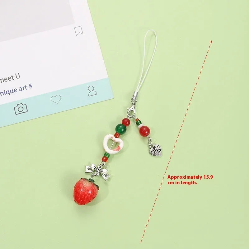 Fruit-themed mobile phone earphone bag pendant keychain in plastic/resin with rope attachment