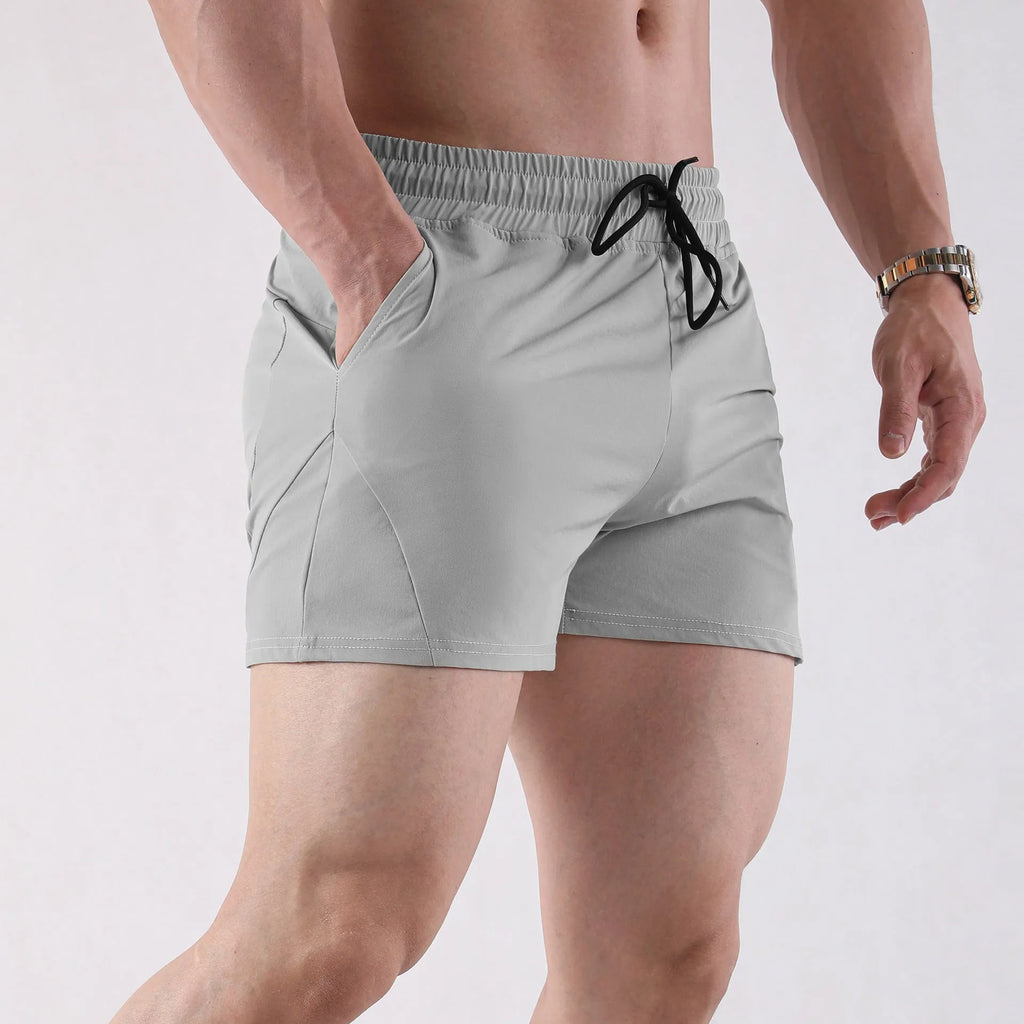 Men's thin polyester basketball shorts in grey, black, apricot, or green with elastic waistband