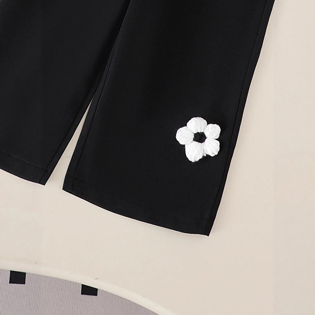 White cotton flower print long sleeve top and black trousers baby outfit set