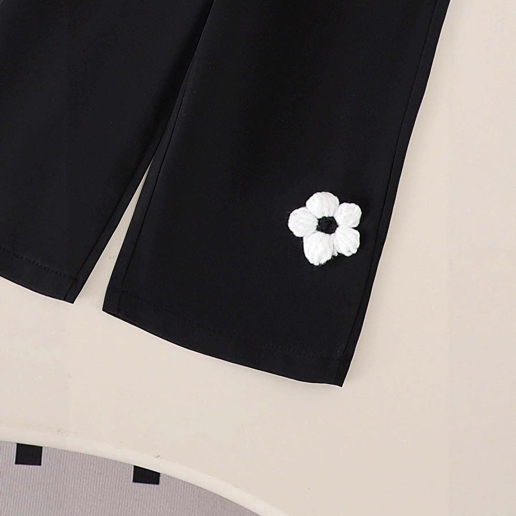 White cotton flower print long sleeve top and black trousers baby outfit set