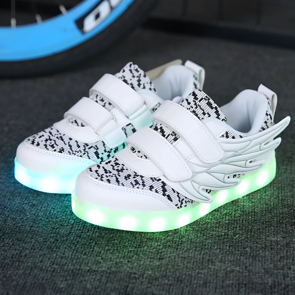 Plum red children's sneakers with colourful LED lights on the soles and sides.