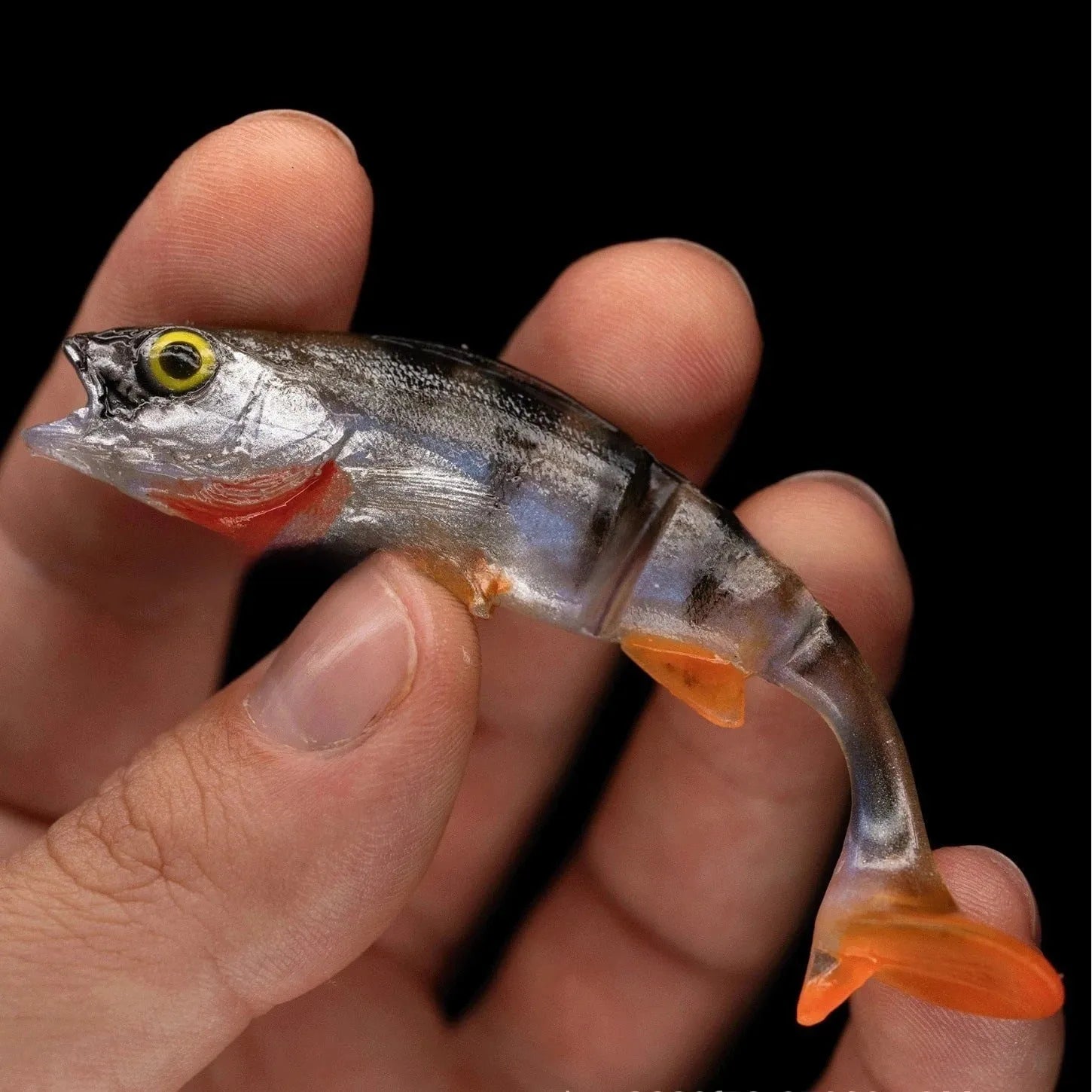 Two soft plastic fishing lures with fish T-tail scissor design and realistic fish colour pattern