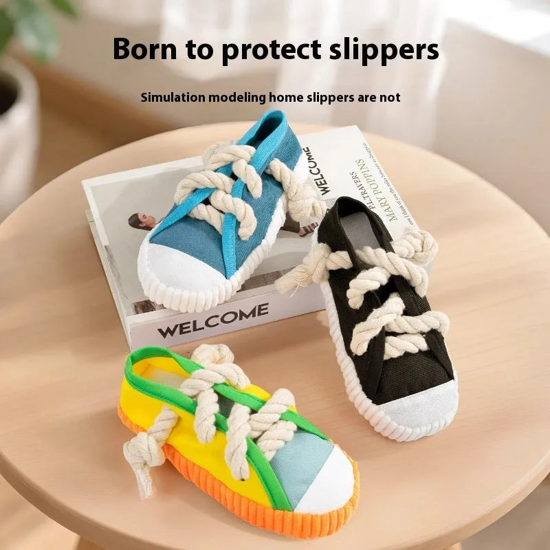Yellow plastic dog chew toy shaped like slippers, with a sound mechanism for pet play.