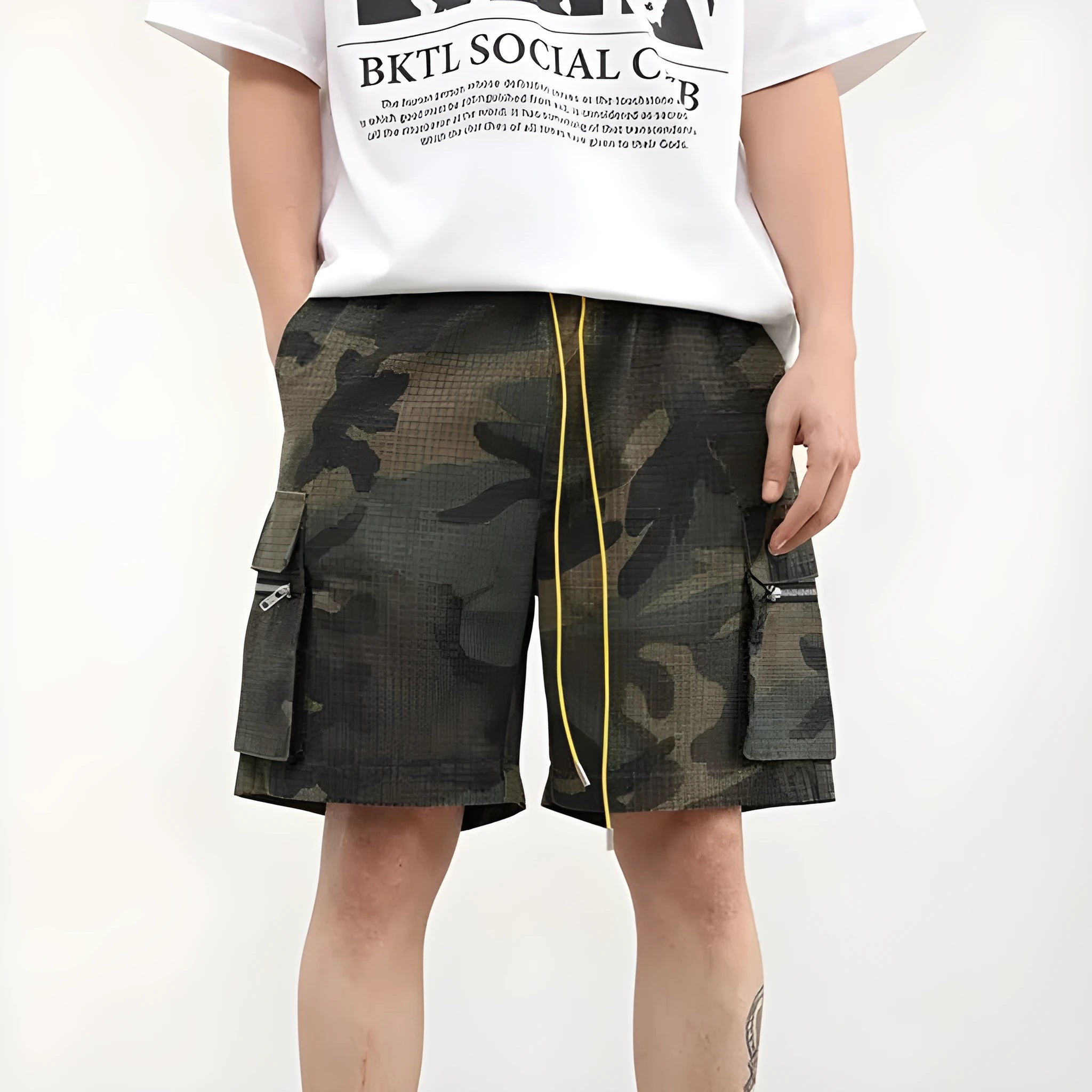 Men's camouflage work shorts with multiple pockets showing cropped length and mid-waist design