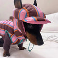 Dirty pink striped polyester dog vest with a matching hat for autumn and winter wear.