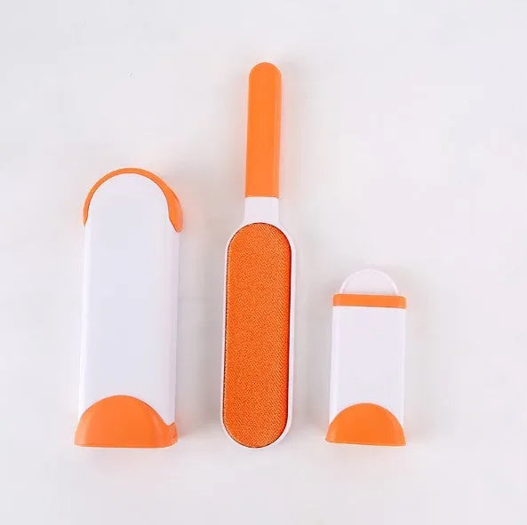 Blue reusable pet hair removal brush with self-cleaning base for furniture and upholstery.