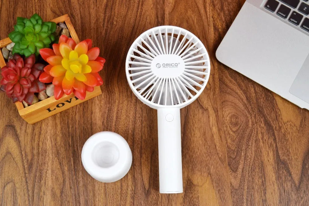 White ORICO FH1 USB rechargeable portable desktop fan with three-speed settings.