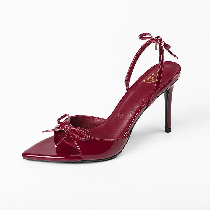 Women's pointed stiletto high heels with open toe and ankle buckle in wine red colour