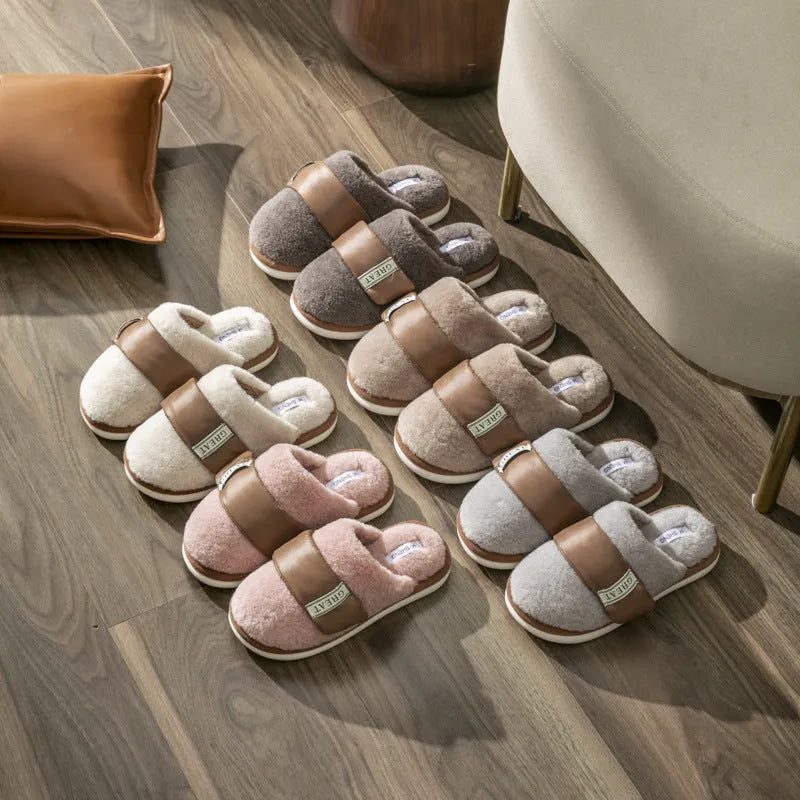 Women's beige plush floor slippers with round toe, flanging detail, and textured plastic sole.