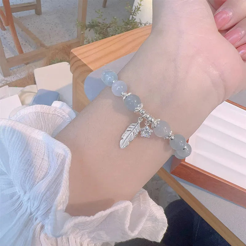 Korean style crystal bracelet with blue moonlight colour and text modelling