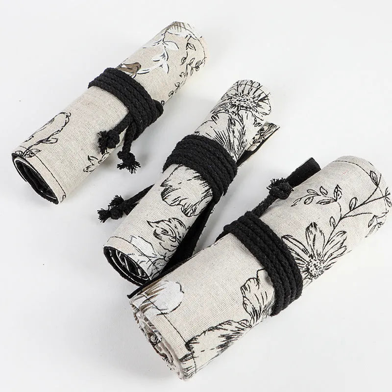 Black peony floral print pencil roll bag in cotton hemp canvas with 24 or 72 hole capacity options