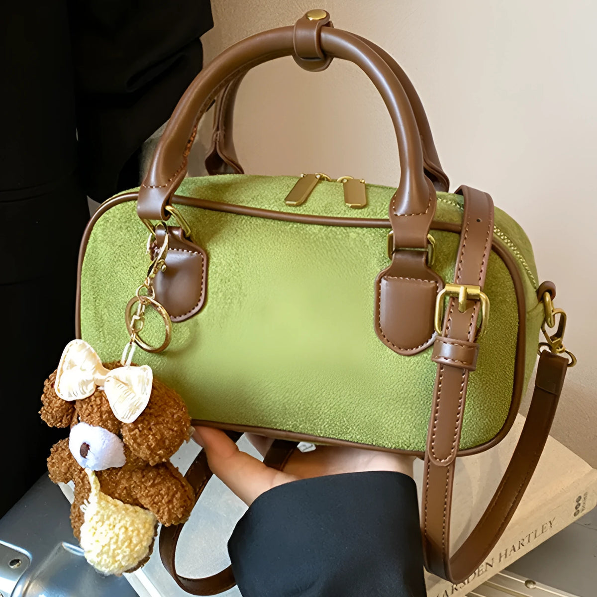 PU bowling bag in black, brown, coffee or green with optional pendant, horizontal square shape and single strap.