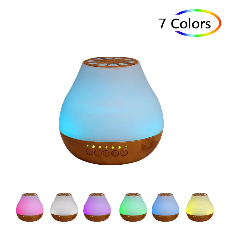 Wood grain finish USB essential oil aroma diffuser with optional Bluetooth control on a table