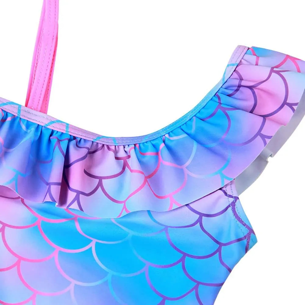 Girls' one-piece swimsuit with scale print and flounced gradient hem in nylon fabric