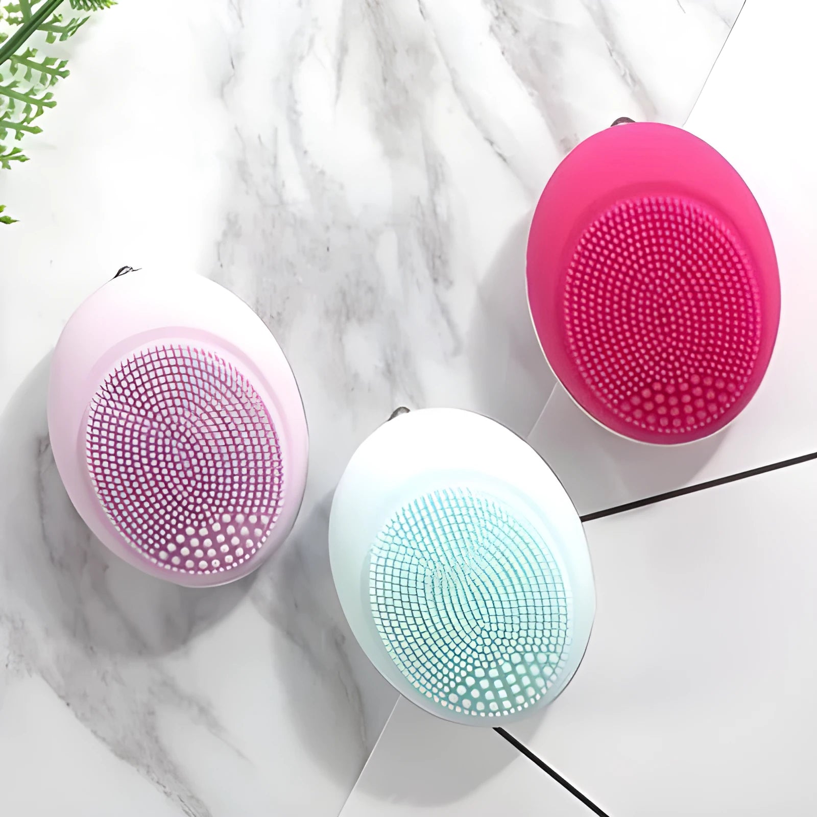 Ultrasonic electric face wash brush in pink with silicone brush head, compact design for deep pore cleansing