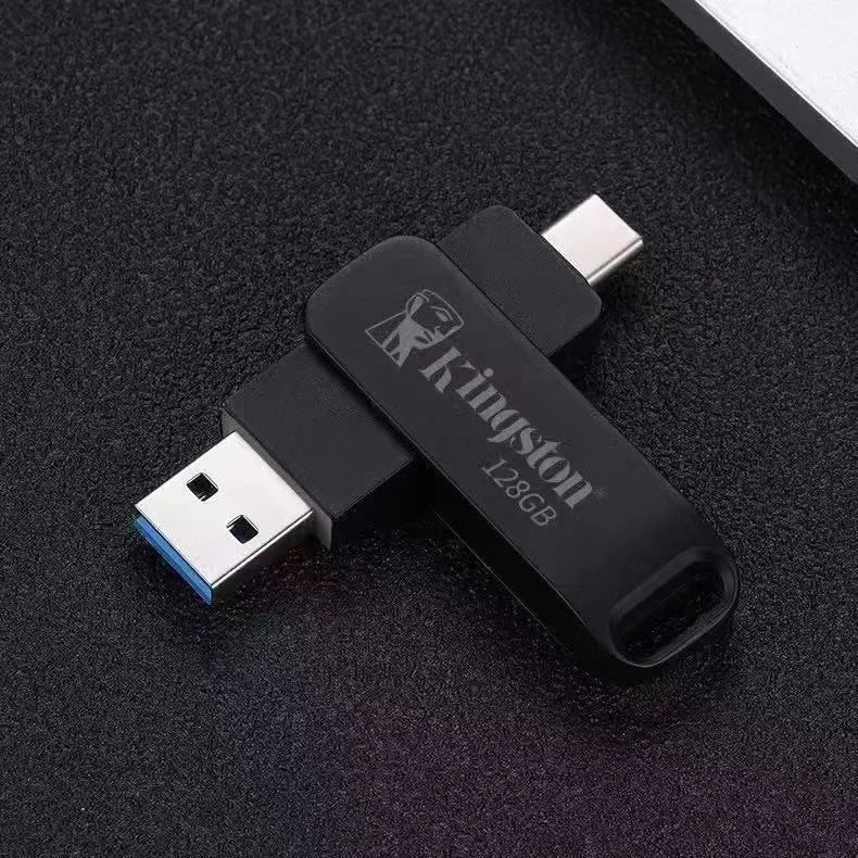 Rotating metal USB flash drive in black showing both USB connector and Type-C interface