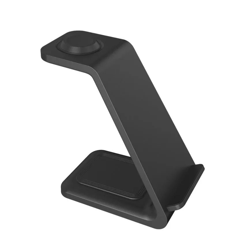 White 3-in-1 upright wireless charging stand holding a mobile phone in landscape orientation on a desk.
