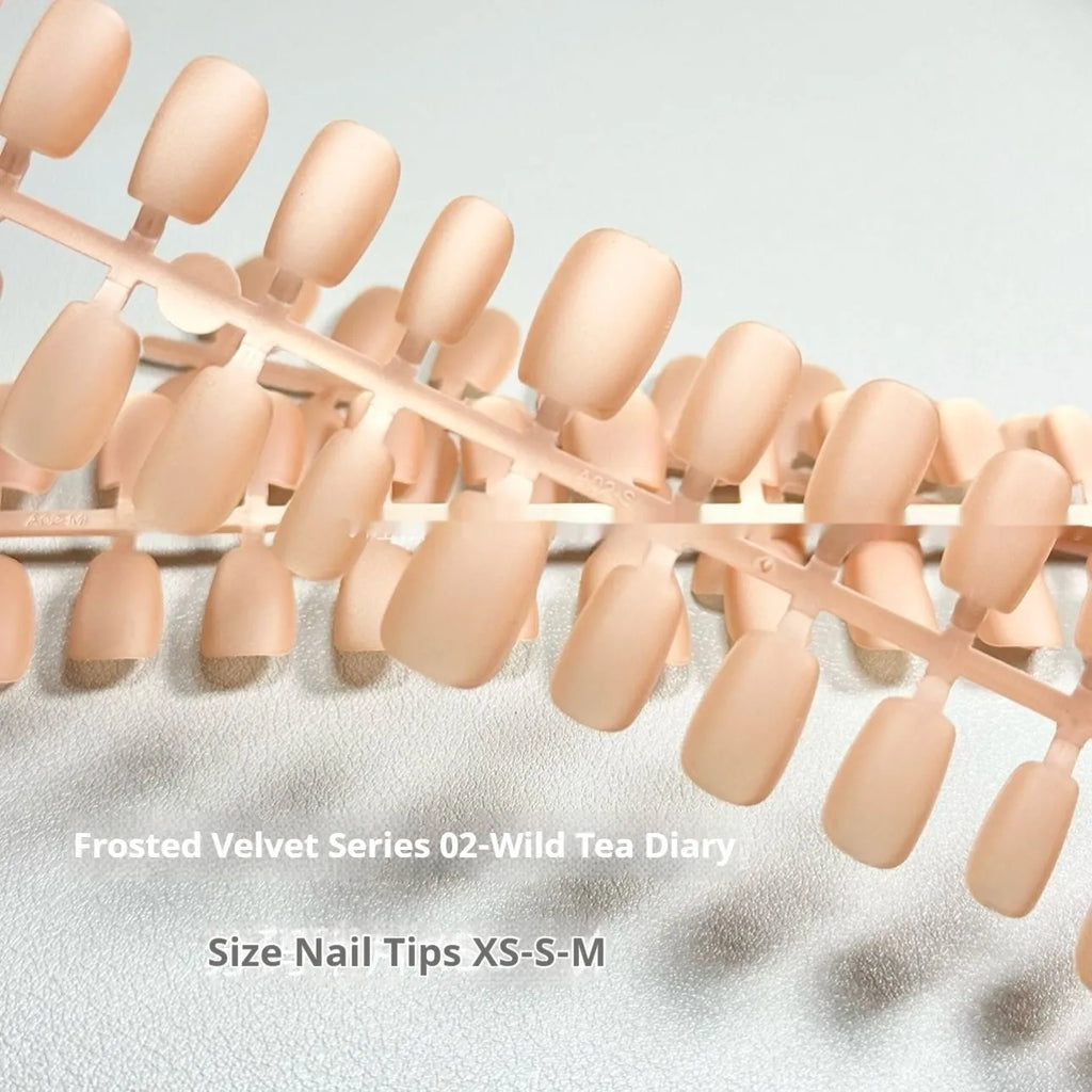 Frosted velvet Cat's Eye effect artificial nail set in short ladder XS, S, and M sizes showing Aurora shades.