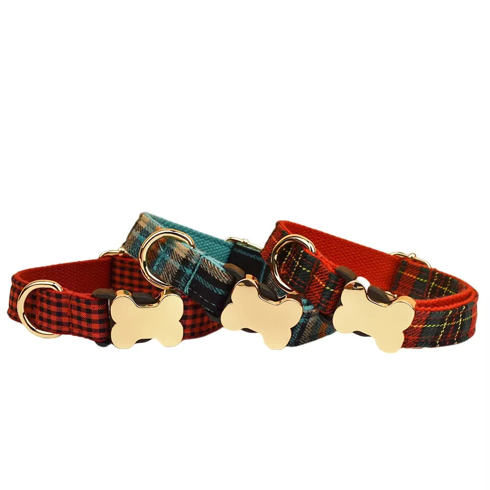 Flat nylon dog collar with grid print and a white plastic bone-shaped quick-release buckle.