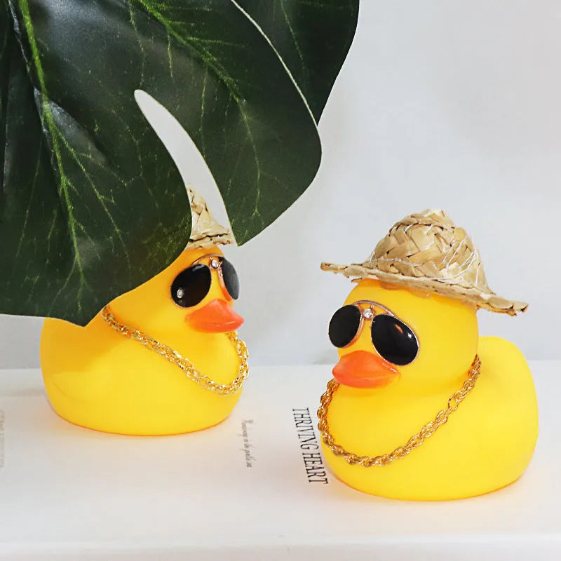 Straw hat yellow duck car dashboard ornament with sunglasses necklace accessory on car interior