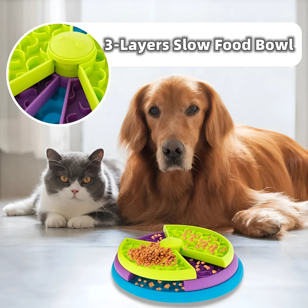 Three-tier rotating slow feeder bowl for cats and dogs, made of PP plastic, 26cm wide, with non-slip base.