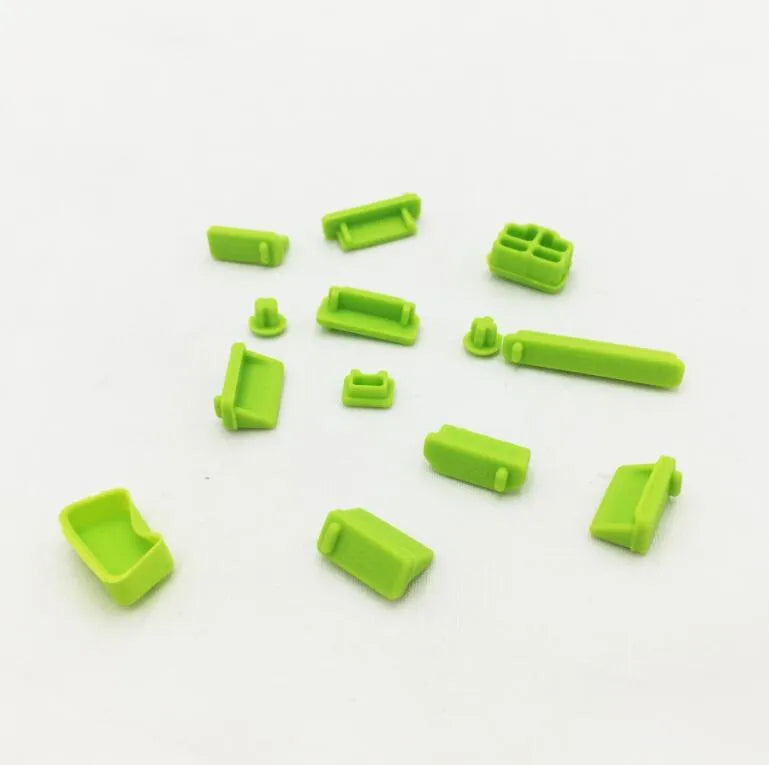 13-piece silicone dust plug set for laptop ports in multiple colours including transparent and black