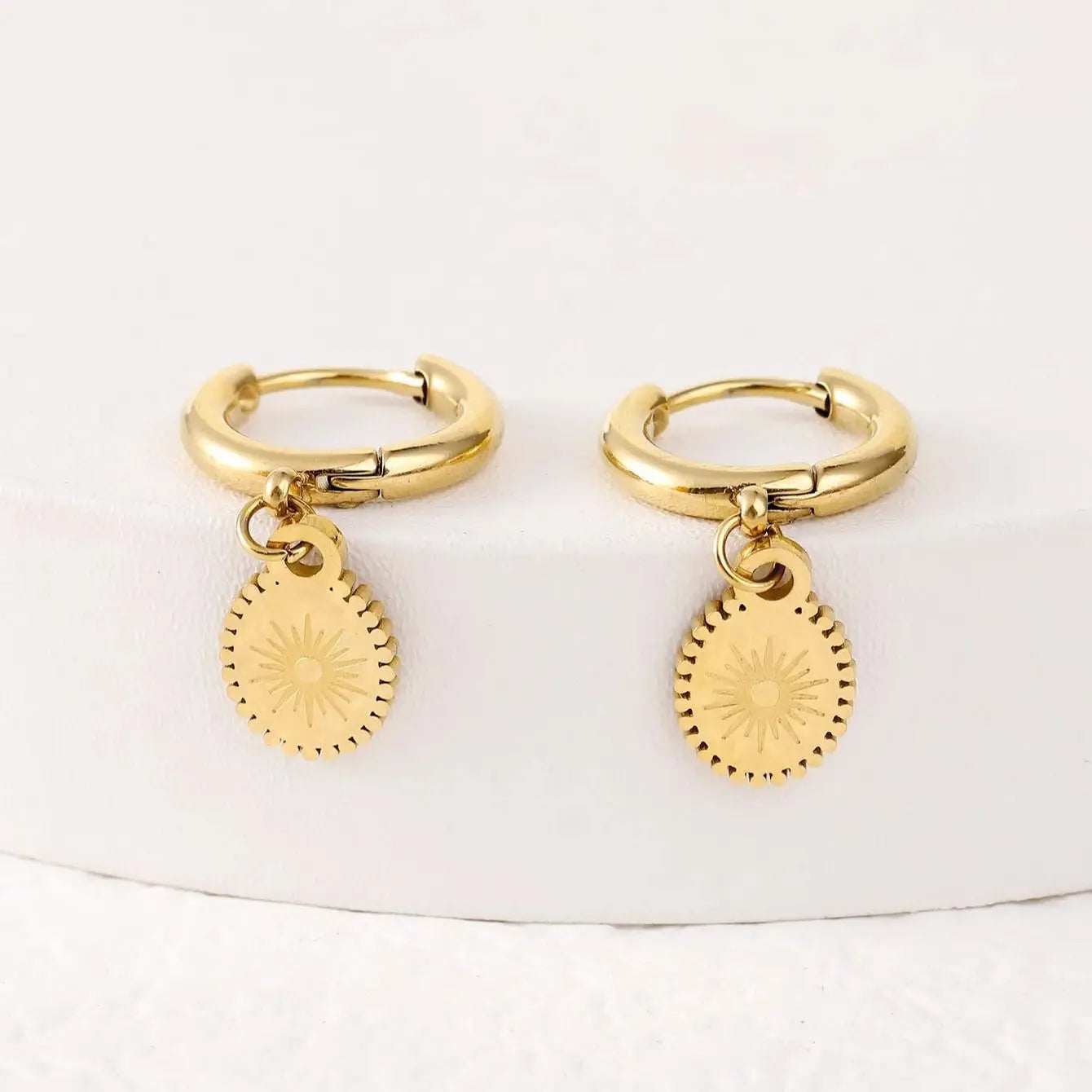 Stainless steel geometric ellipse ear button earrings in colour XY-EH005.