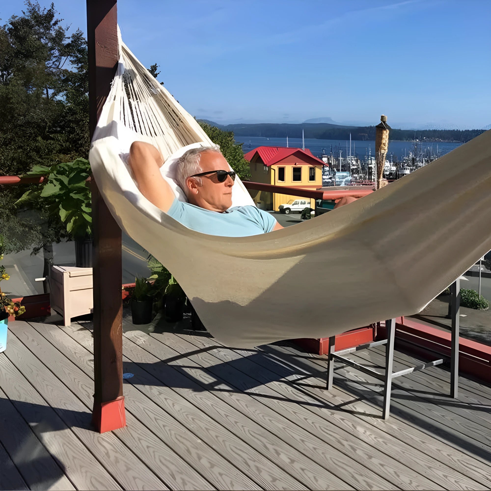 Cotton camping hammock with tree strap for outdoor backpacking and garden relaxation