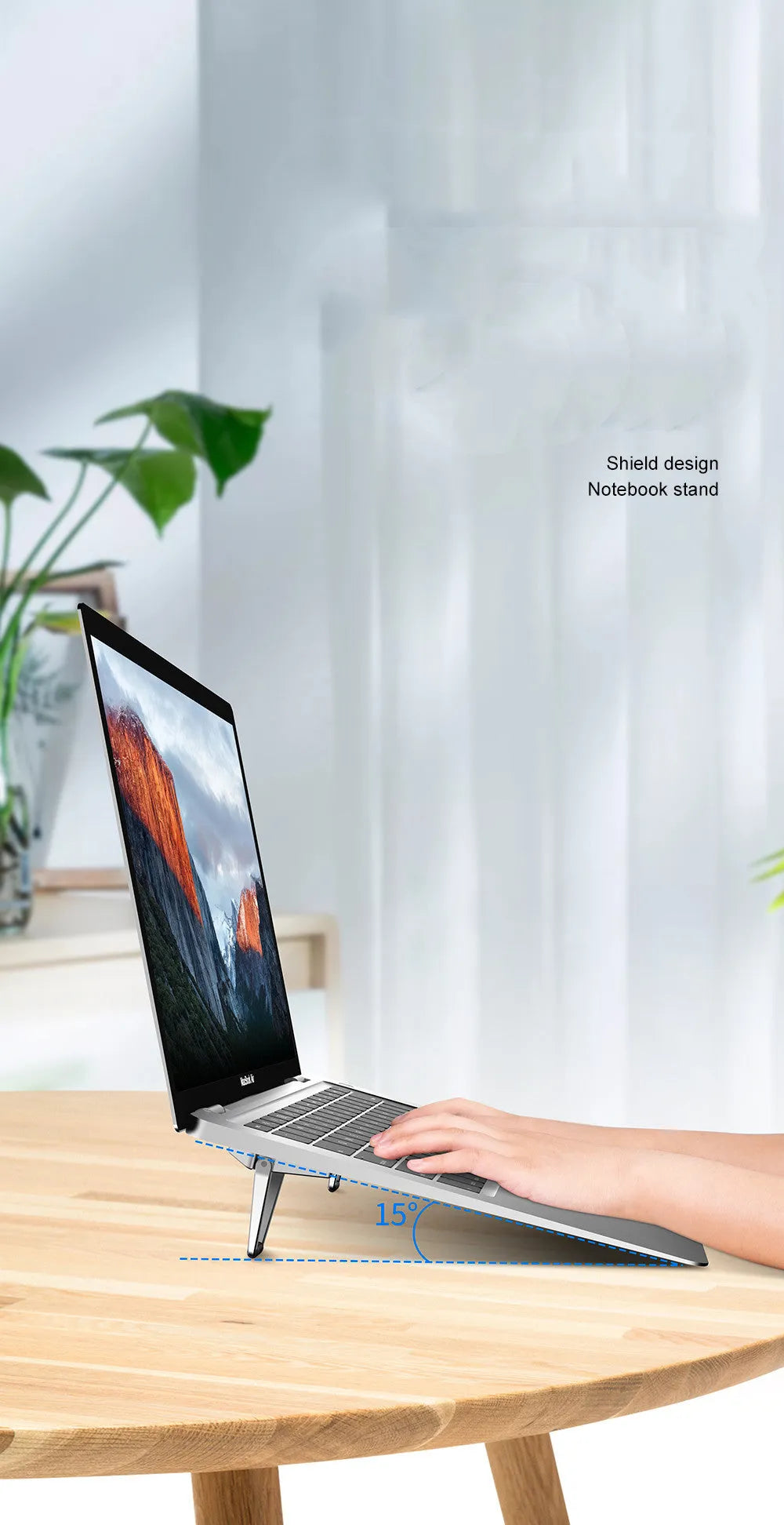 Two black and silver zinc alloy metal foldable tablet computer cooling brackets on a desk, 4.8cm size