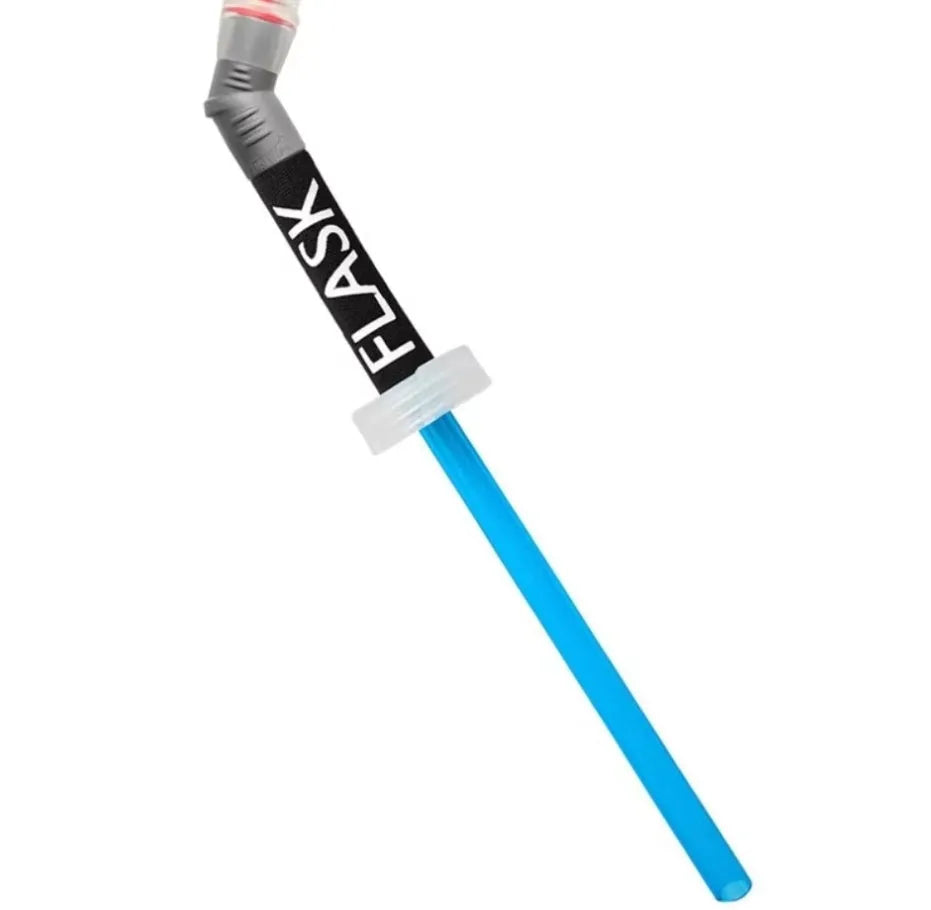 Close-up of a portable plastic drinking straw with bite valve, shown next to a sports bottle cap.