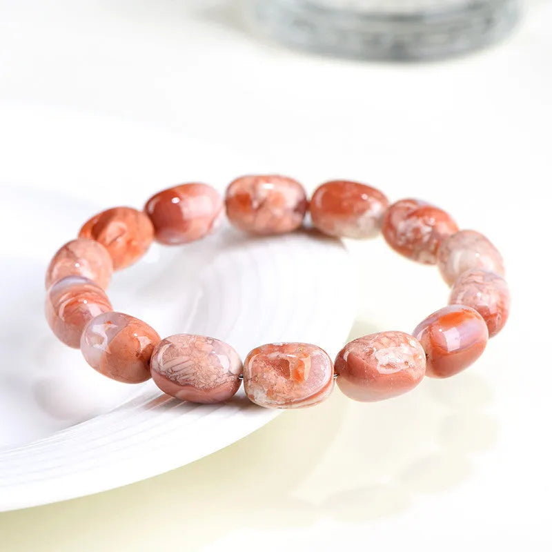 Natural cherry agate barrel bead bracelet with ruyi decorative elements