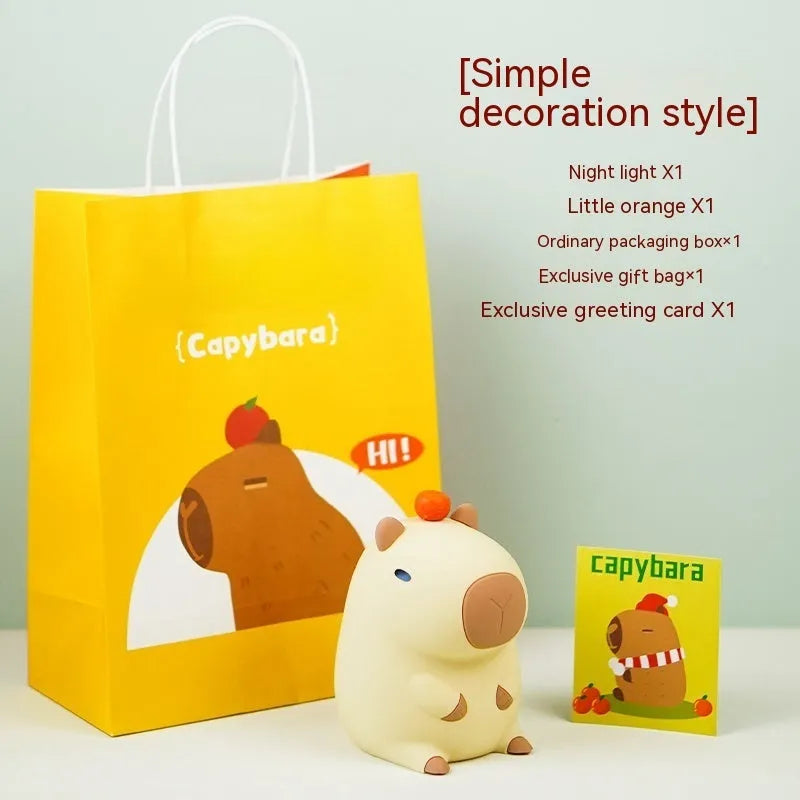 Cute capybara-shaped small night lamp on a table, showing its size and design.
