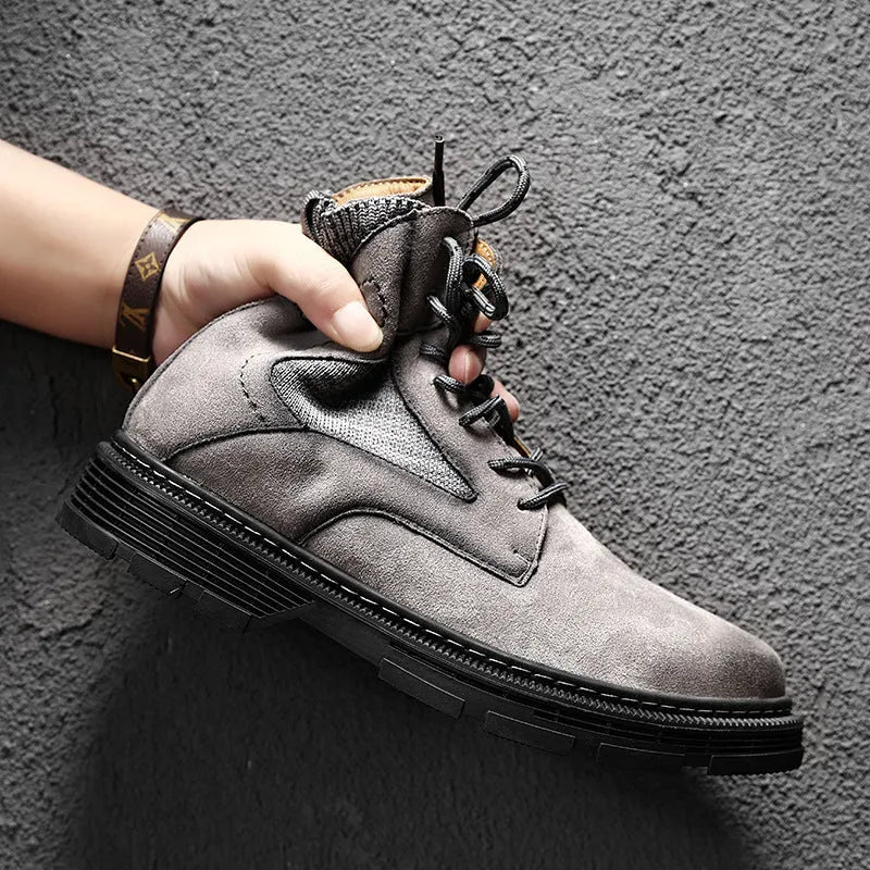 Men's ankle-high Martin boots in frosted grey microfibre leather with a thick rubber sole.