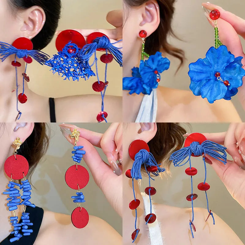 Geometric women's earrings with round elements and silver needle blue resin flower on cloth material
