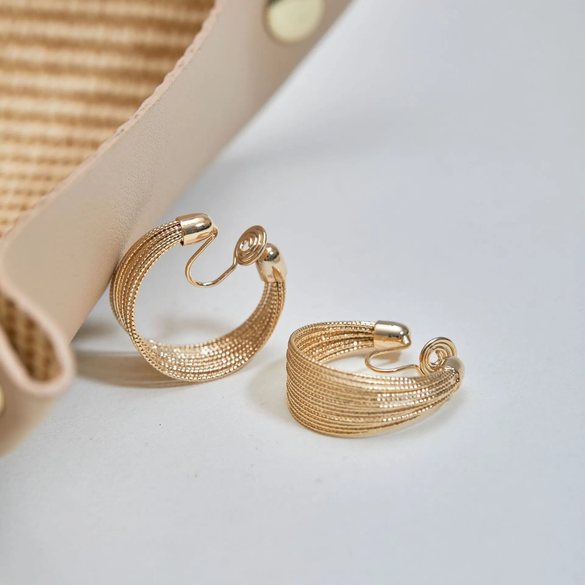 Multi-layer geometric bracelet earrings in gold and silver with stud and clip options