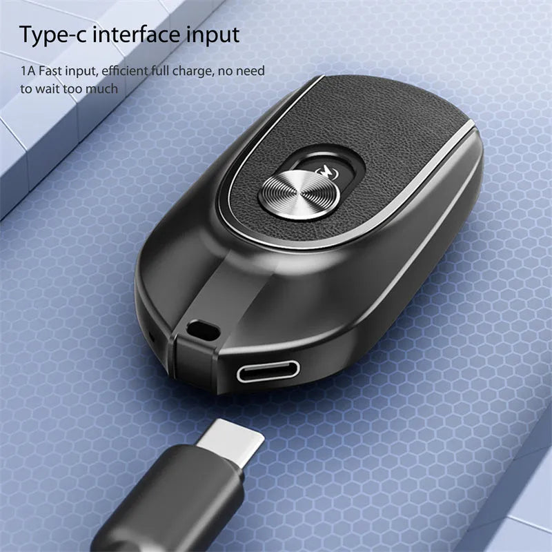 Black mini keychain power bank with Type-C and iPhone outputs, 1200mAh, hanging buckle, 71 x 19.5 x 38mm