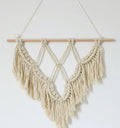 Boho style macrame wall hanging handmade from cotton rope, 40x50cm, pink colour with fringed ends and wooden rod
