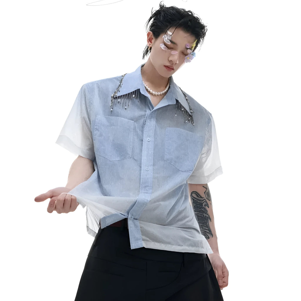 Blue and white gradient loose short shirt with half sleeves on a hanger.