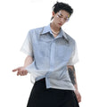 Blue and white gradient loose short shirt with half sleeves on a hanger.