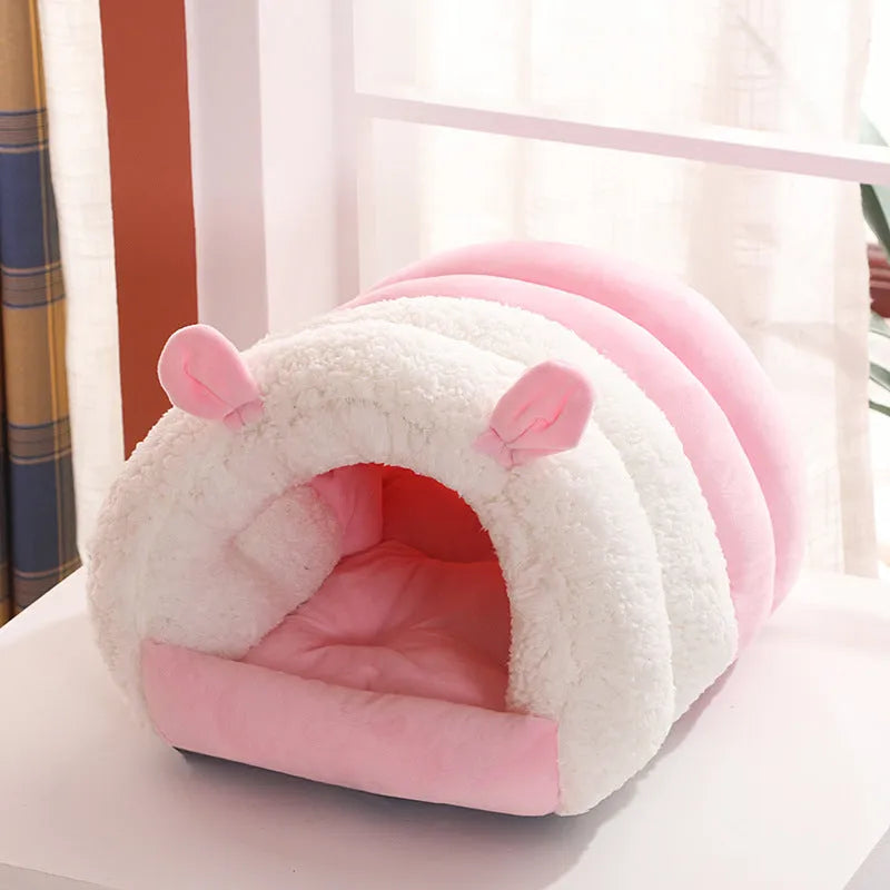 Blue enclosed cat nest bed with removable fleece liner, shown in a small size suitable for a kitten.