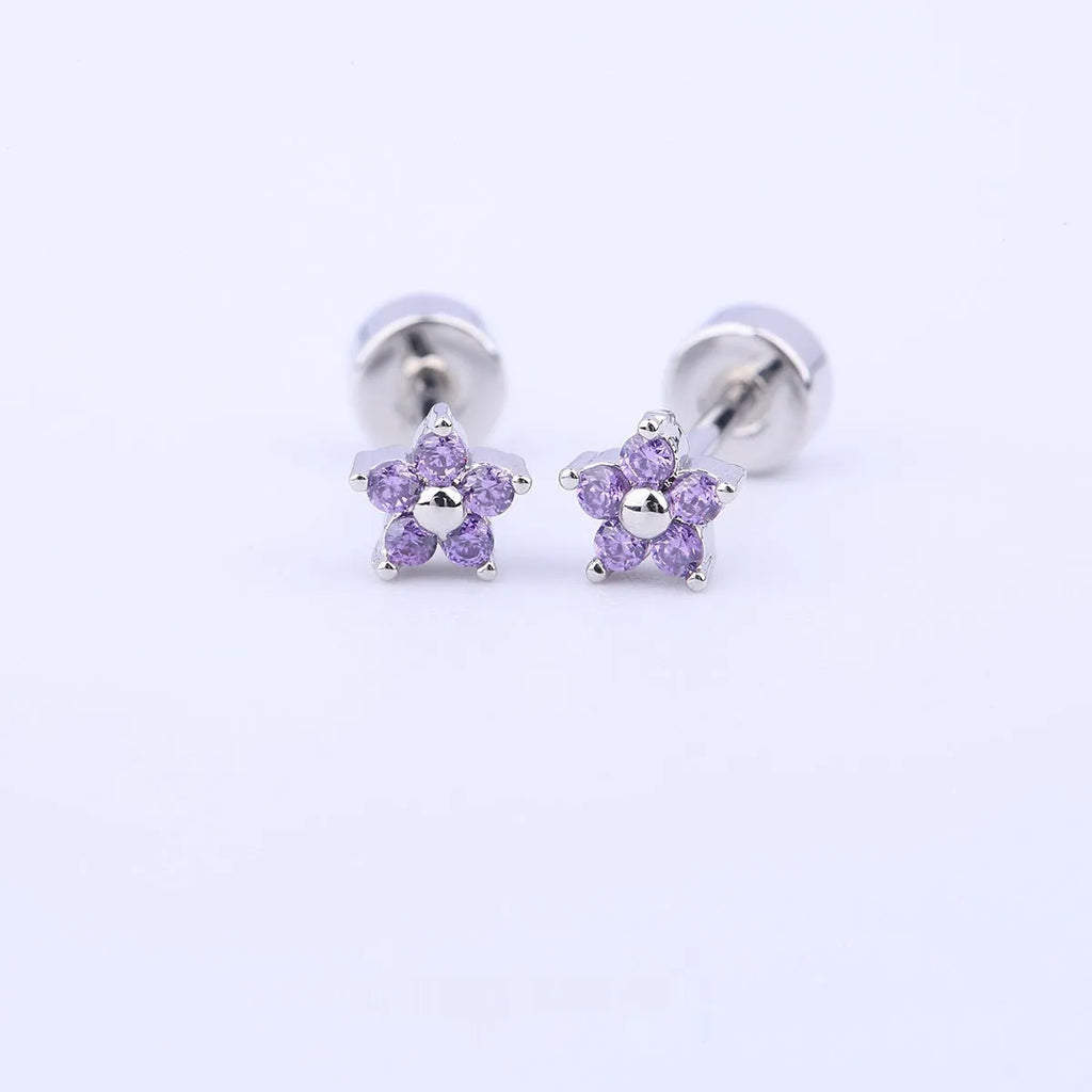 Copper-plated gold micro inlaid zircon five-petal plum flower ear studs on a white background, unisex design, real gold thick plating