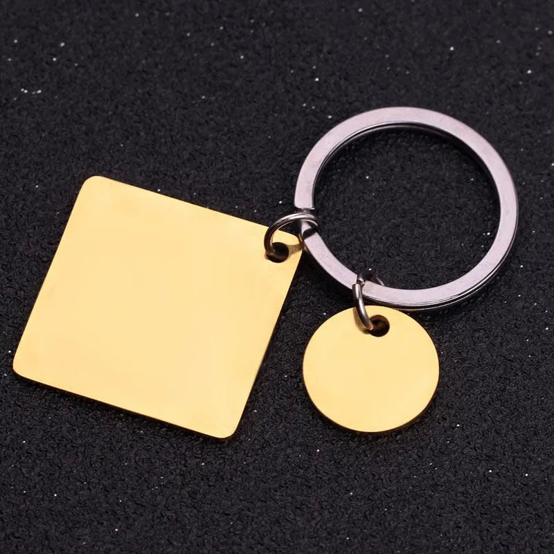 Custom engraved stainless steel calendar keychain with date, gold plating, 30x30mm, on a white background