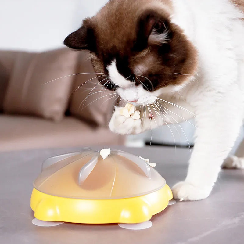 Yellow interactive pet puzzle feeder bowl with ridges and treat compartments on a white background.