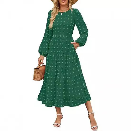 Women's beige long sleeve dress with ruffled sleeves and a high waist, shown on a hanger.