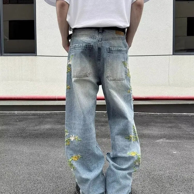 High street casual wide leg denim trousers in blue, mid waist zip fly style, straight leg cut