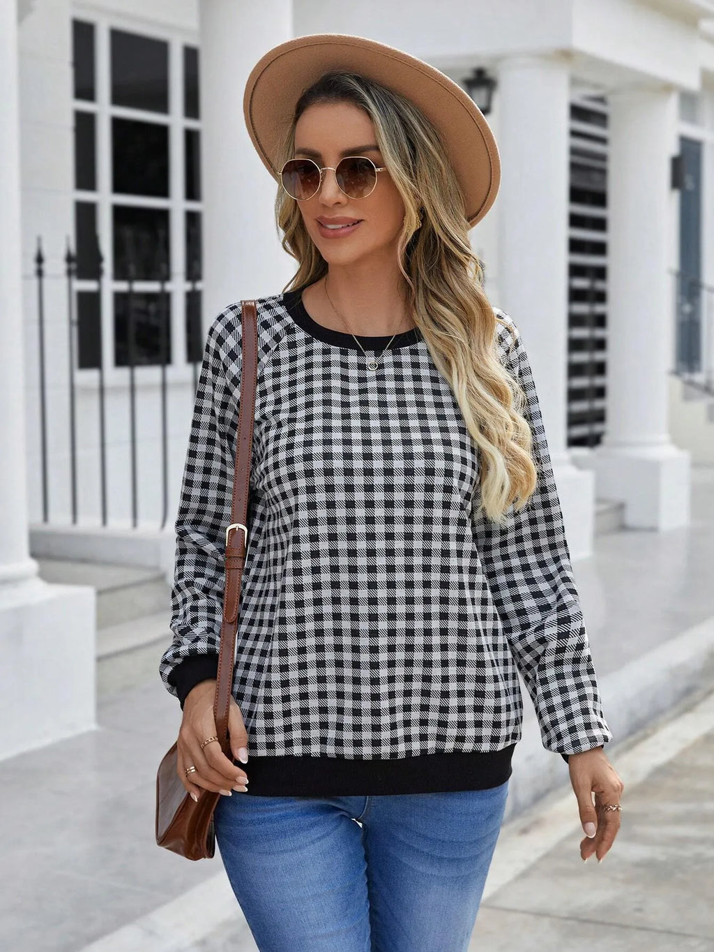 Black long sleeve polyester pullover sweater with a printed Japanese sweet plaid stripe pattern.
