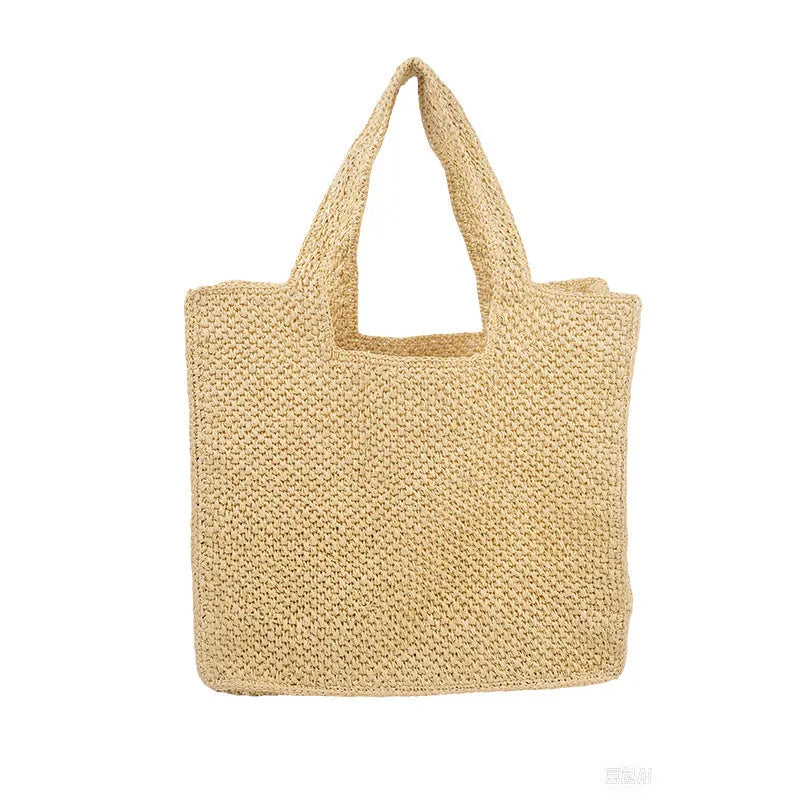 Straw woven bucket tote bag in khaki colour with double straps and open pocket.