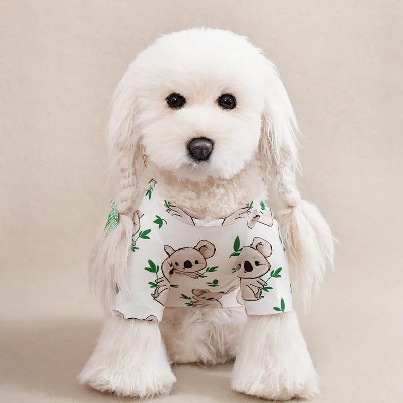 Small dog wearing a full-printed blue polyester T-shirt, showing the casual fit and design.