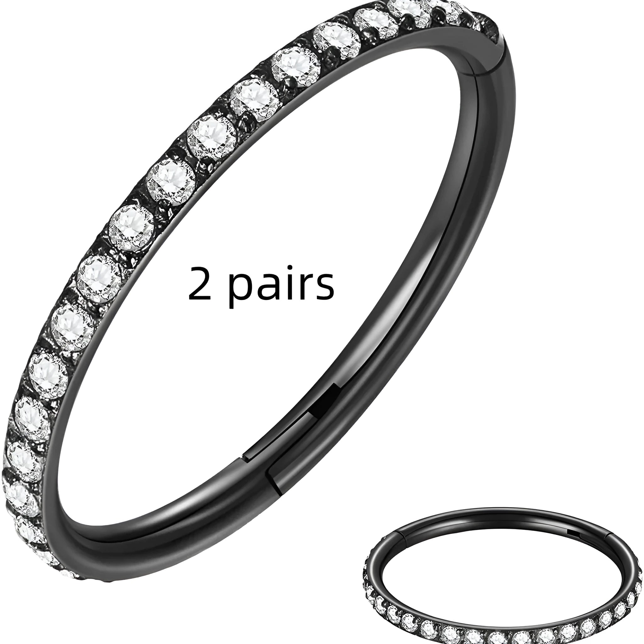 A stainless steel seamless nose ring in a round shape, shown alongside two pairs of matching stud earrings.